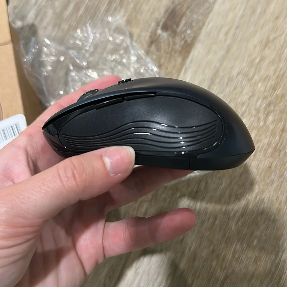 Wireless Black Computer Mouse with blue tint